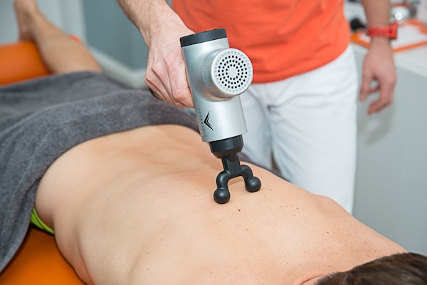 Behandlung anhand der Vibrationsmassage